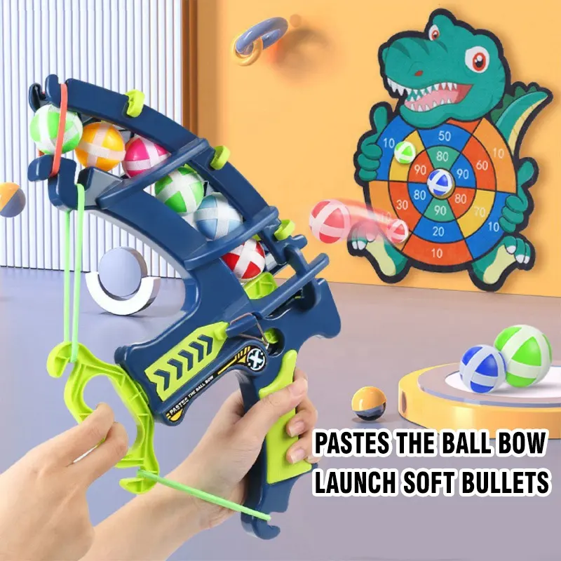A gun with sticky balls and a crocodile board