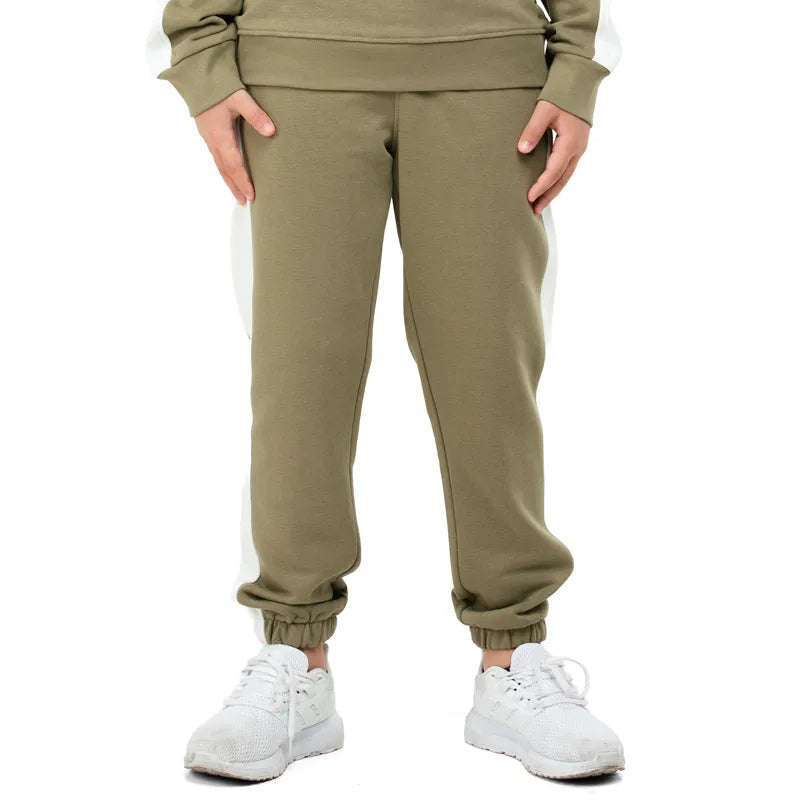 Lower portion of boys' ski jumping trainers oriented east, olive color