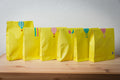 Nora package set of five paper bags yellow