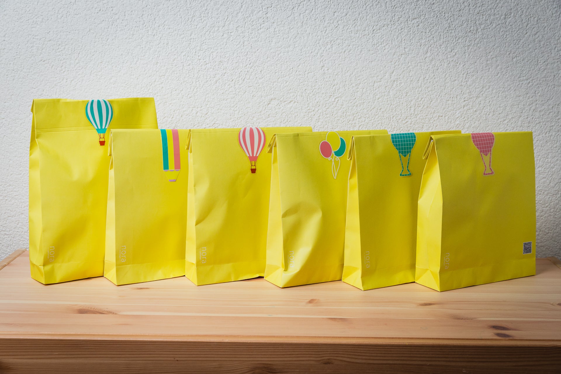 Nora package set of five paper bags yellow