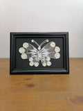 Picture of butterfly in filigree technique